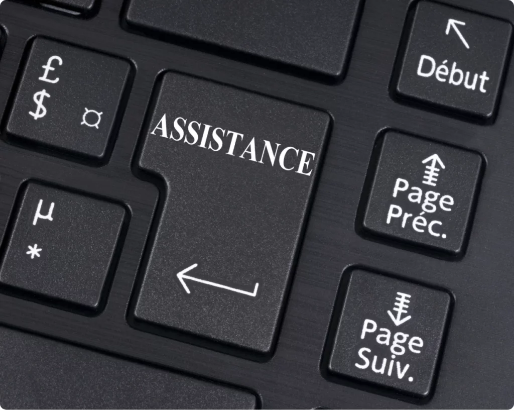 touche de clavier portant l'inscription assistance
